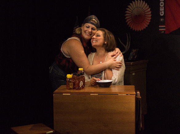 image0 Two women embrace during a scene from Exit, Pursued by a Bear at RD Studio Theatre in North Hollywood.