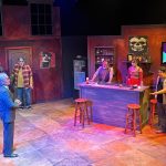 Five actors perform a tense scene inside a Boyle Heights bar in Dive Bar at CASA 0101 Theater.